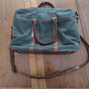 Satchel and Page green canvas briefcase with leather detail